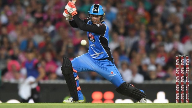 On top of his game: Alex Carey flays the Sydney Sixers bowling.