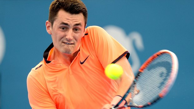 Sluggish: Tomic playing against David Ferrer in a condition he described as less than ideal.