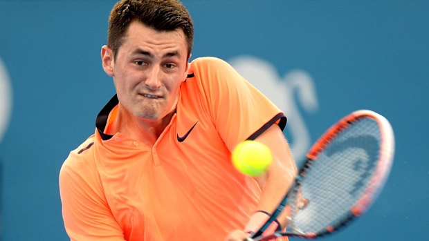 Sluggish: Tomic playing against David Ferrer in a condition he described as less than ideal.