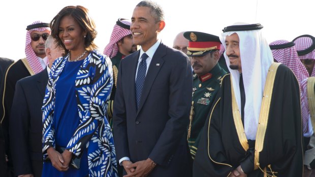 Former President Barack Obama and wife Michelle with King Salman in 2015. Donald Trump criticised her bare head then; his wife Melania embraced the look on her visit.