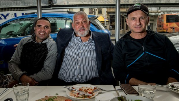 Anthony Mundine, Mick Gatto and Danny Green's trainer Angelo Hyder at a Carlton restaurant ahead of the Green-Watts fight in Melbourne.