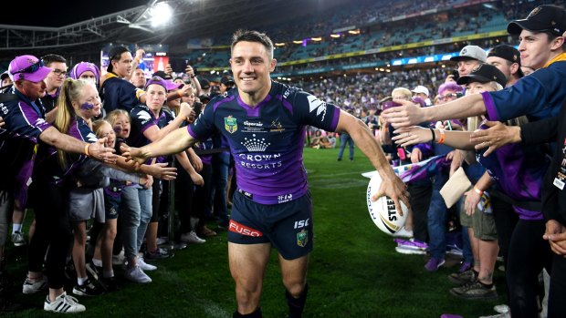 Star quality: Cooper Cronk earns another grand final medal earlier this month.