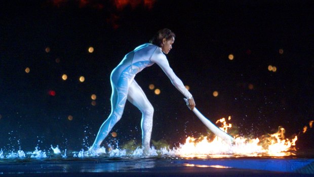 Runner Cathy Freeman ignites the Olympic flame at the opening ceremony for the 2000 Games in Sydney.