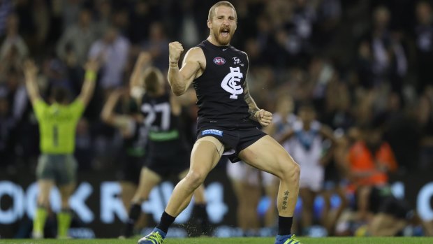 Carlton's Zach Tuohy celebrates on the siren after a Blues win earlier in the season. 