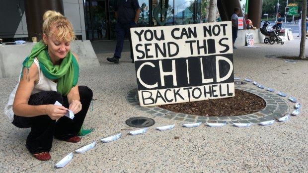 Scotia Monkivitch was one of about 50 protesters still at the vigil for baby Asha at Brisbane's Lady Cilento Hospital on Sunday morning.