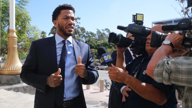 NBA star Derrick Rose outside court in 2016. His lawyer, Mark Baute, said media reporting on this case was biased against the black men.