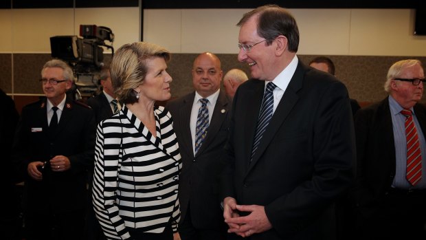 Foreign Affairs Minister Julie Bishop speaks with Loughnane in 2013. 