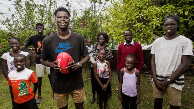Nyadol Nyuon's brother Gach, an AFL draft prospect, and members of her family  in 2015.