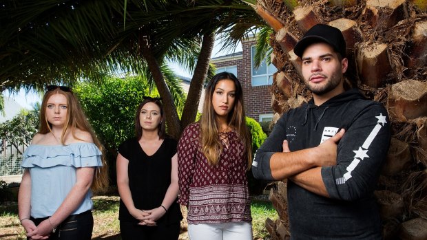 IGA supermarket workers Jimmy Siljanovski (R) with his colleagues (L-R) Tahlia Lemon, Lauren Morrison and Khadija Acone.