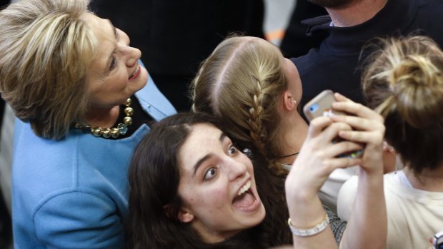 Democratic presidential candidate Hillary Clinton meets attendees during a campaign stop.