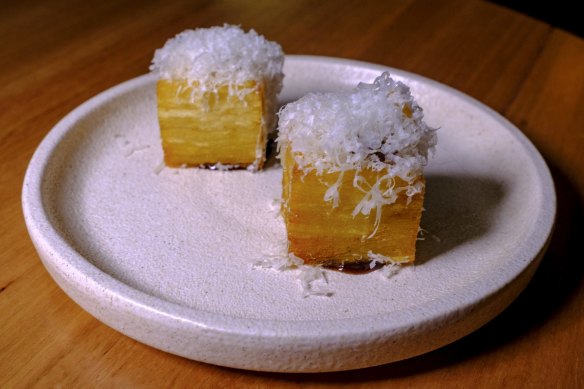 Pommes anna with black garlic vinegar and parmesan.