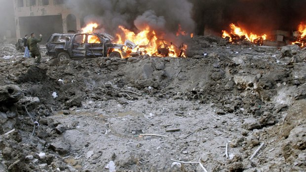 February 14, 2005: the crater formed after a car bomb destroyed the motorcade of  Rafiq al-Hariri.