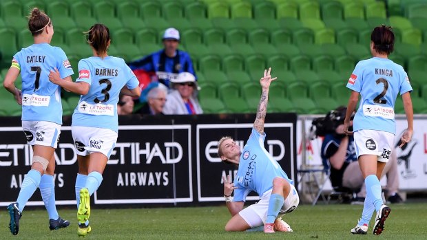 Looking up: Jessica Fishlock celebrates after scoring her second goal for Melbourne City in the round 7 match against Canberra United at AAMI Park.