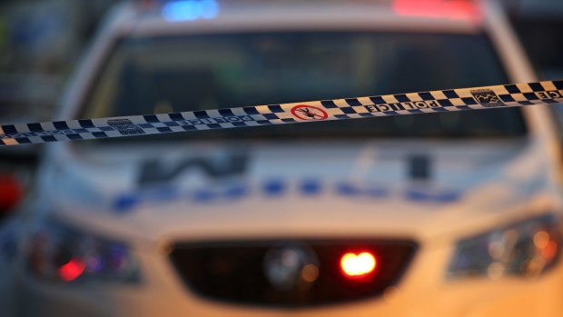 A man armed with a knife has threatened a female postal worker in Kingston at lunch time on Monday.