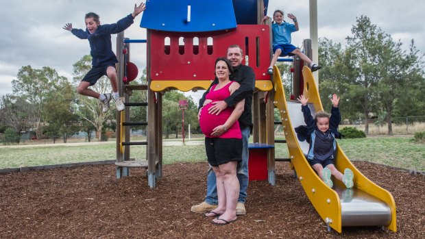 Emma and Matt Keen, with children Patrick, 11; Laura, seven, and Lily, five will be welcoming rare identical triplets in the next couple of weeks.