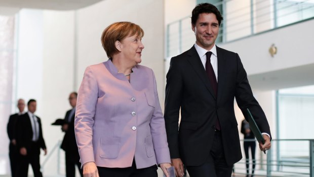Like-minded: German Chancellor Angela Merkel, left, and the Prime Minister of Canada Justin Trudeau last week.