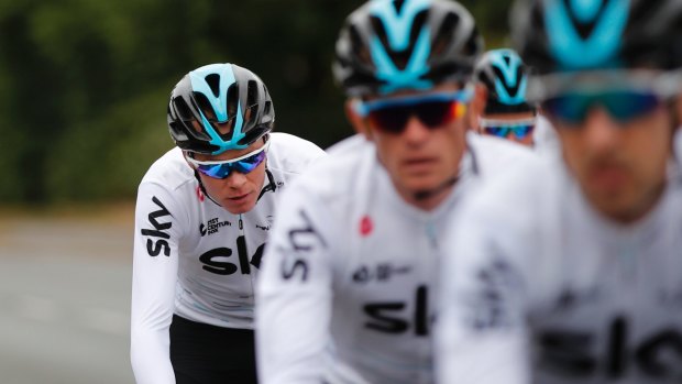Three-time Tour de France winner Chris Froome rides out with his Team Sky teammates in Düsseldorf on Thursday.