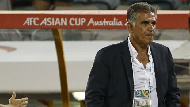 Bye, bye: Iran coach Carlos Queiroz looks angry after his team's defeat in the Asian Cup quarter-finals.