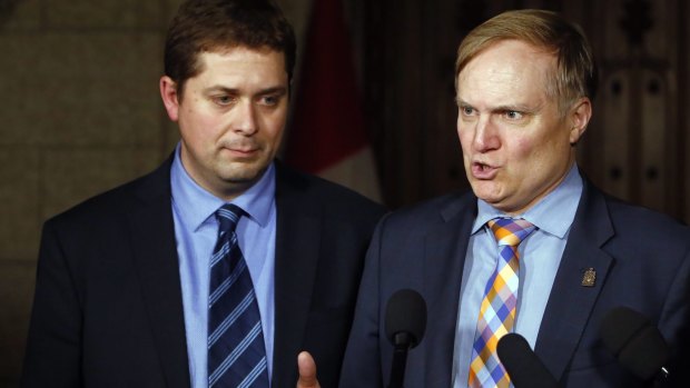 Canadian Conservative House Leader Andrew Scheer, left, with Peter Julian NDP House Leader, said Mr Trudeau clearly "lost his temper".