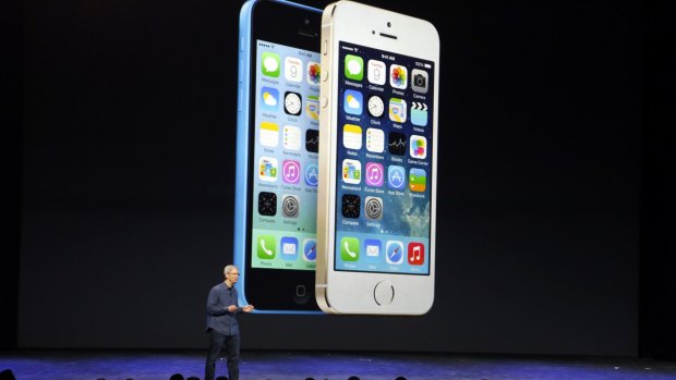 Apple CEO Tim Cook speaks during an Apple event to announce the iPhone 6
