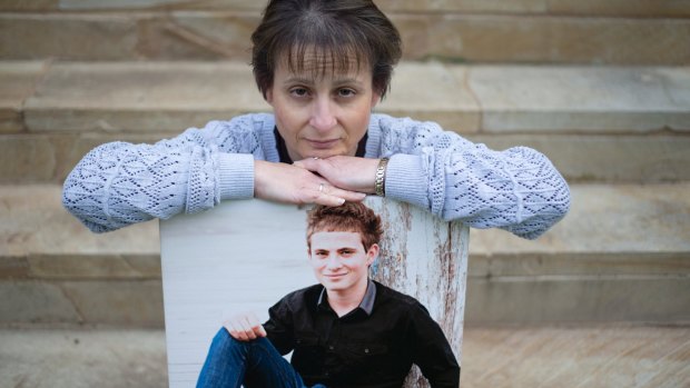 Colleen Vassallo with a picture of her late son Philip who died in a car accident while driving an old car.