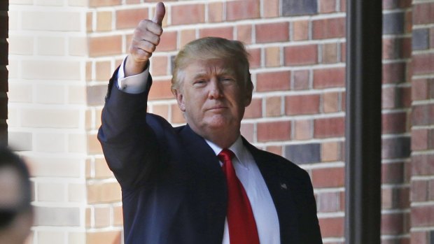Thumbs-up: Trump leaves the residence of the Indiana Governor on Wednesday. 
