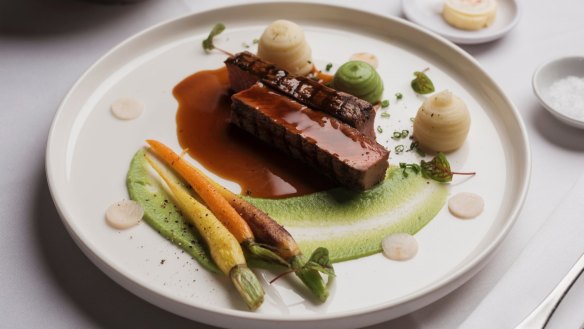 Cootamundra grass-fed lamb loin with heirloom carrots, pomme mousseline and pea puree.