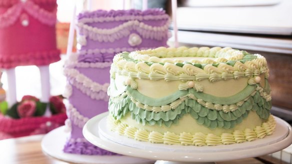Cakes decorated with buttercream ruffles at Le Petit Cafe Rose.