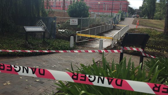 Equipment from a nearby construction site had been swept into the creek.
