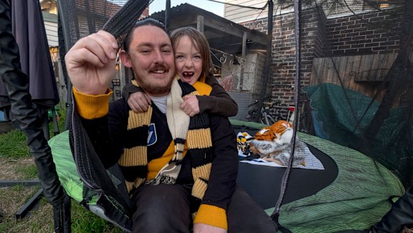 John Carr, with six-year-old son Richmond.