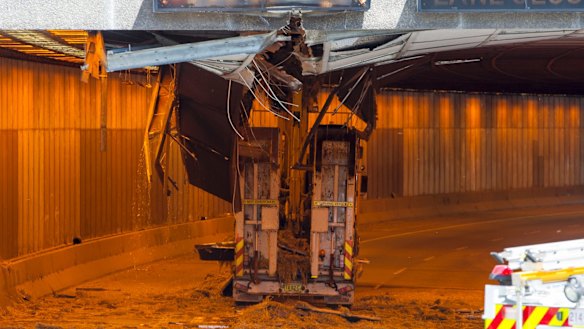 The truck and its excavator on the day of the crash on October 20, 2015. 