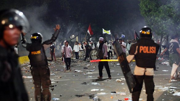 Police during the rally against Ahok in Jakarta. 