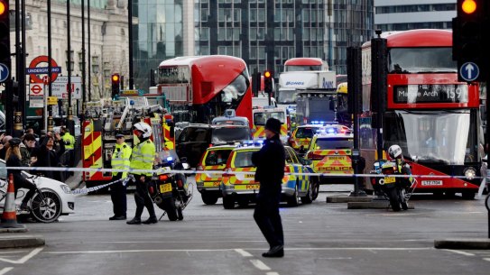 Police close the area near Houses of Parliament, London, after sounds similar to gunfire have been heard close to the Houses of Parliament, London, Wednesday, March 22, 2017. The leader of Britain's House of Commons says a man has been shot by police at Parliament. David Liddington also said there were "reports of further violent incidents in the vicinity."London's police said officers had been called to a firearms incident on Westminster Bridge, near the parliament. Britain's MI5 says it is too early to say if the incident is terror-related. (Victoria Jones/PA via AP)