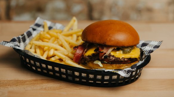 The menu includes plenty of burger add-ons.
