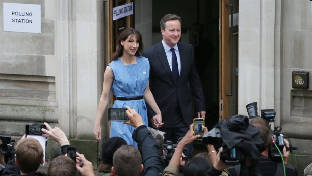 Britain's Prime Minister David Cameron and his wife Samantha leave after casting their votes in the EU referendum at a polling station in London.