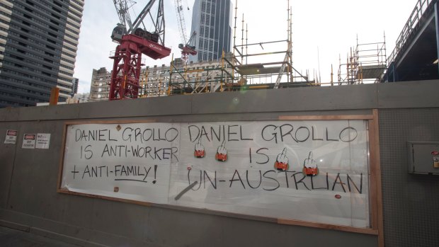 Striking CFMEU workers at the Grocon Emporium building site in Melbourne make their feelings known in September, 2012.
