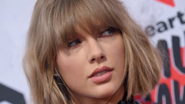 Taylor Swift's latest romance has been a lucrative game for photographers. 