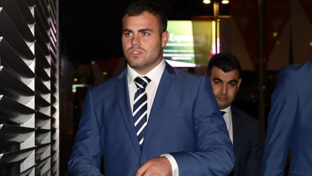 Reflex action? Cronulla Sharks forward Wade Graham arrives at League Central for his hearing on Wednesday night.