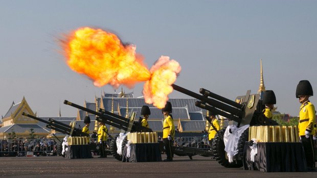An artillery gun is fired at the funeral procession and royal cremation ceremony of late Thai King Bhumibol in Bangkok on Thursday.