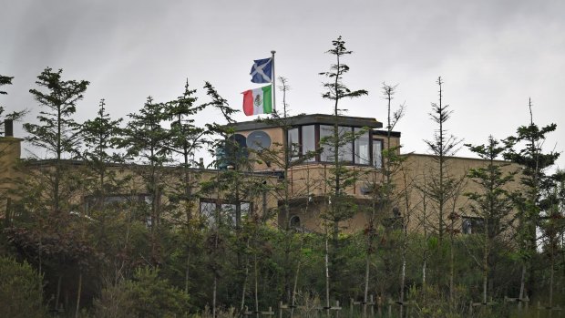 Properties bordering Donald Trump's Scottish golf course fly the Mexican flag during his visit in June.