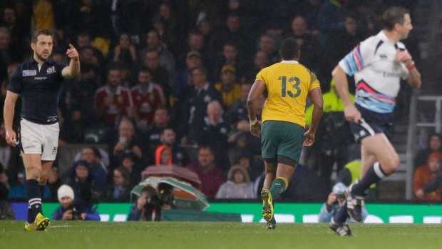 Frantic: Scotland captain Greig Laidlaw, left, points as South African referee Craig Joubert, right, runs off the pitch after blowing the final whistle.