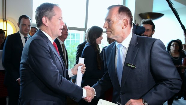 Closing the Gap proves a sensitive topic for politicians: Bill Shorten greets Prime Minister Tony Abbott.