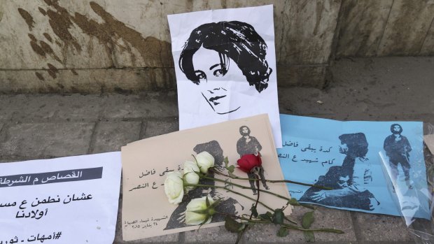 Flowers are seen left at the spot where activist Shaima al-Sabbagh died during a protest in Cairo.