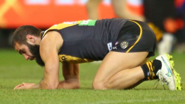 Kicking himself: Tiger Bachar Houli was criticised for an errant kick-in late in his team's loss to Fremantle.