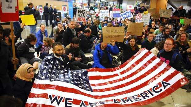 Sit down: A demonstration against Donald Trump's executive order on immigration at Seattle-Tacoma International Airport.