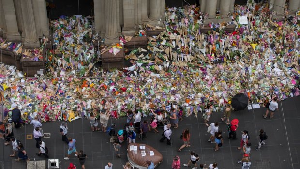 The makeshift floral memorial that appeared on Bourke Street for the victims of the January attack.