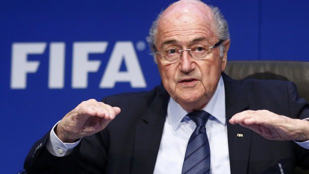 Defiant as always: Re-elected FIFA president Sepp Blatter gestures during a news conference on Saturday after an extraordinary executive committee meeting in Zurich.