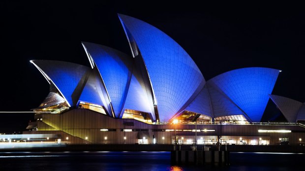 The Sydney Opera House is lit blue on April 2, 2015, on the United Nations' World Autism Awareness Day. 