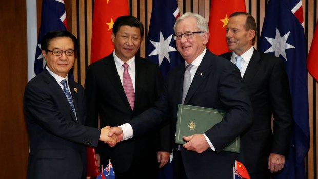 Chinese Commerce Minister Gao Hucheng, Chinese President Xi Jinping, Trade Minister Andrew Robb and Prime Minister Tony Abbott at the signing of the Declaration of Intent on Australia's FTA agreement with China in November.