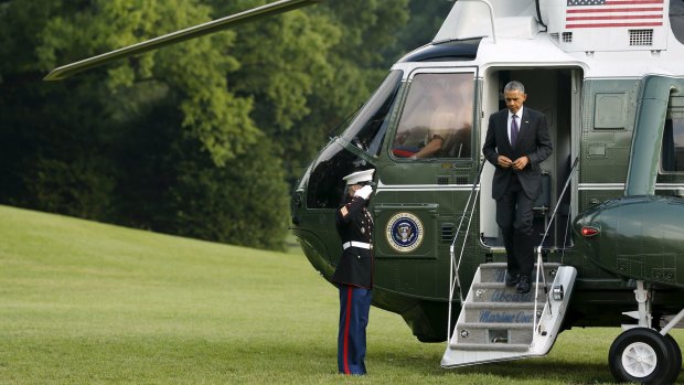 US President Barack Obama returns via Marine One helicopter to the White House.